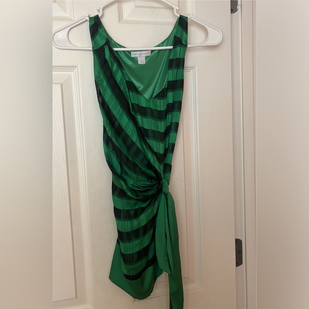 Green and black striped women’s blouse. Size small